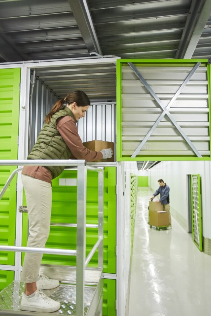 Woman packing box in storage box